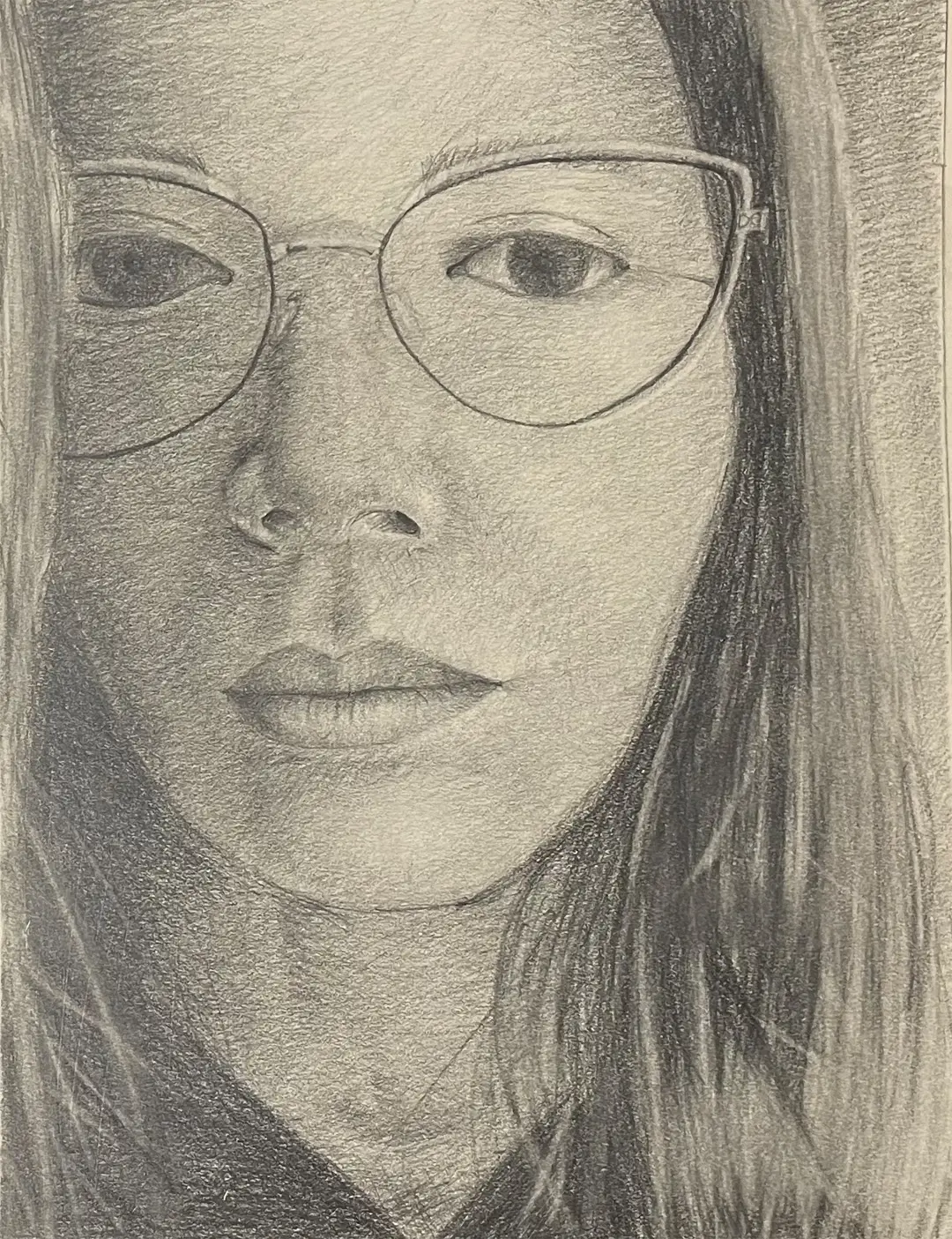 After photo of a close-up face sketch of a woman with glasses during Art Class in North Burnet–Gateway, showing refined detail and accuracy