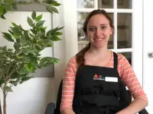 Portrait of an art teacher at Austin art school, highlighting professionalism and dedication to student learning