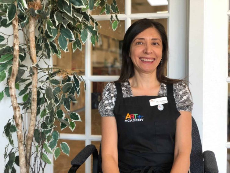 Portrait of an art teacher at Austin art school, highlighting professionalism and dedication to student learning