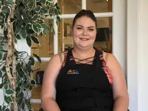 Portrait of an art teacher at Austin art school, highlighting professionalism and dedication to student learning