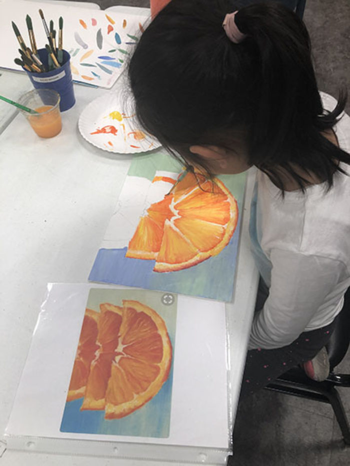 8 year old girl in painting class for kids at ART + Academy.