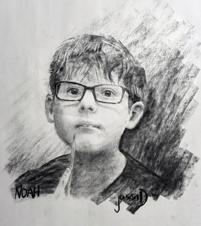 Charcoal portrait on newsprint paper of a young boy with glasses by Mr. Jason Daves