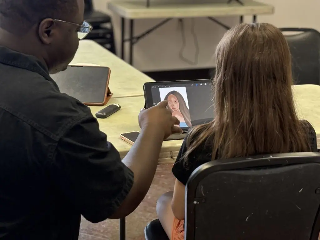 Mr. Jonathan and Digital Art class student