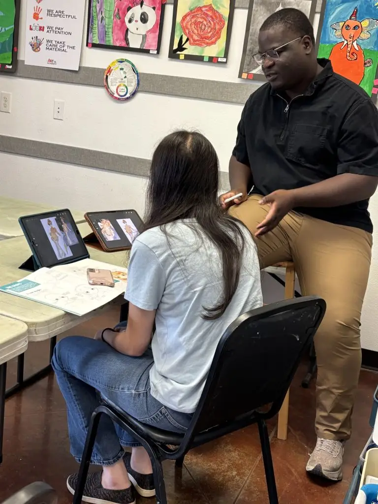 Mr. Jonathan and Digital Art class student