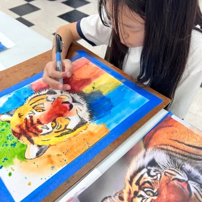 Colorful tiger artwork by child aged 9–12 created during Art Class in Belterra, showcasing bold creativity and technique