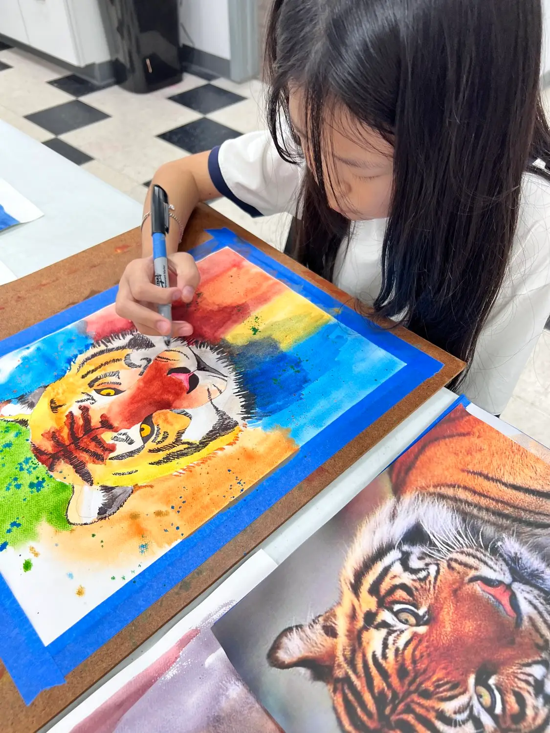 Colorful tiger artwork by child aged 9–12 created during Art Class in Belterra, showcasing bold creativity and technique