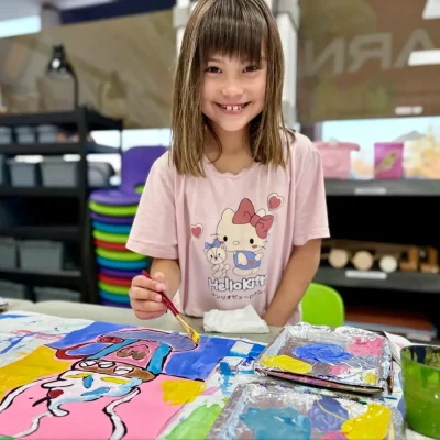 6 years old student learning painting techniques and brush technique